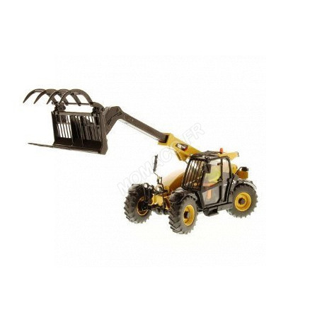 CATERPILLAR TH407C TRACTEUR SUR ROUES AVEC FOURCHE ET FIGURINE